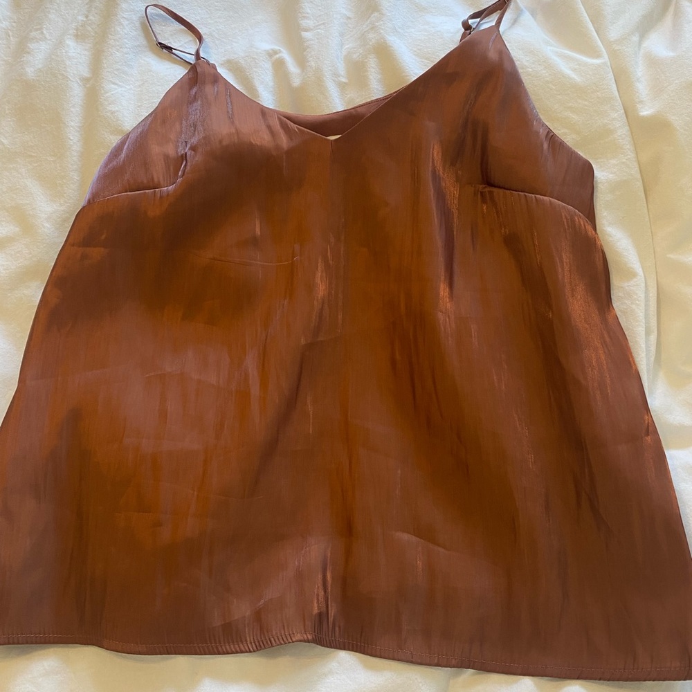 A New Day copper spaghetti trapped top. Adjustable straps. Size medium.